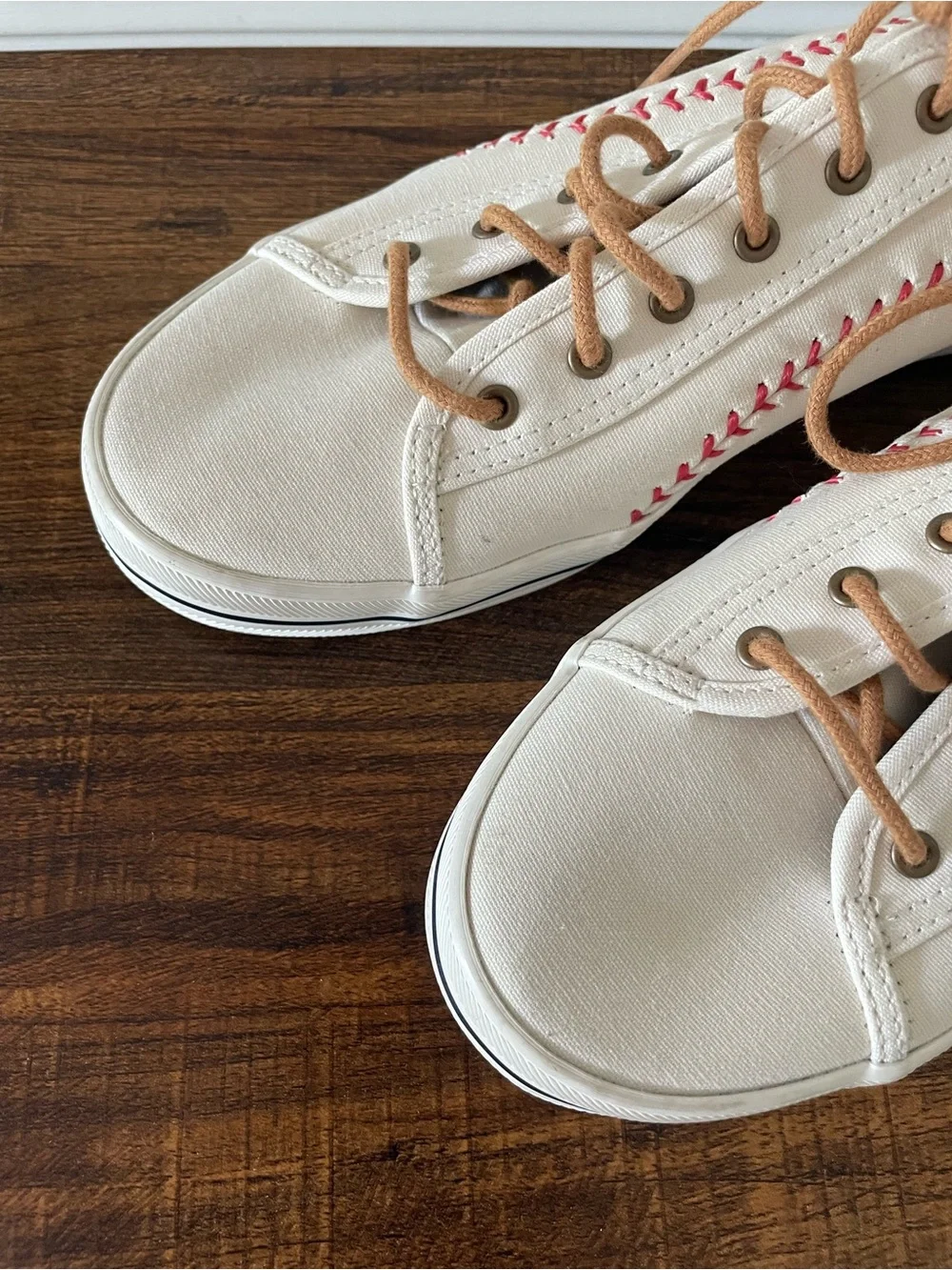 Keds White Canvas Sneakers with Red Stitching and Tan Laces